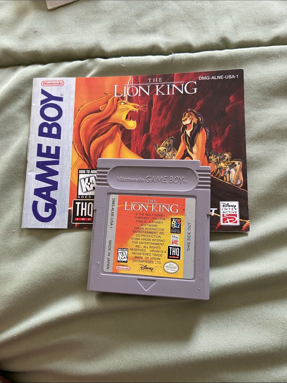 Nintendo Lion King cartridge and booklet